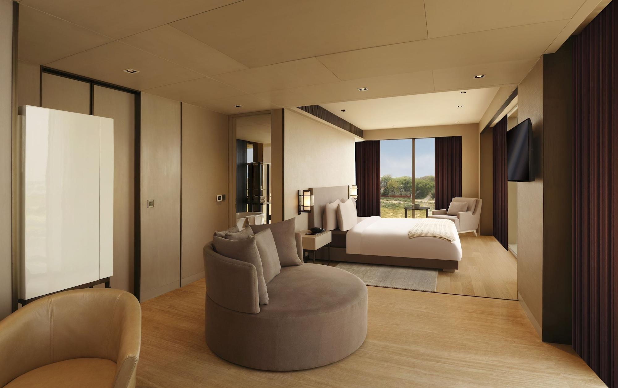 Roseate House New Delhi Hotel Bagian luar foto A bedroom at the hotel